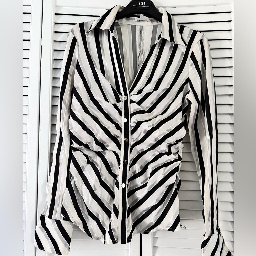 Caché brand , off white black & silver blouse bottom , size M like new